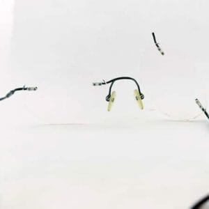 Rimless Titanium Eyeglass Left Bridge Weld